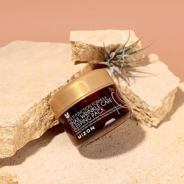 Nakts pretnovecošanās maska ar gliemežu ekstraktu Mizon Snail Wrinkle Care Sleeping Pack